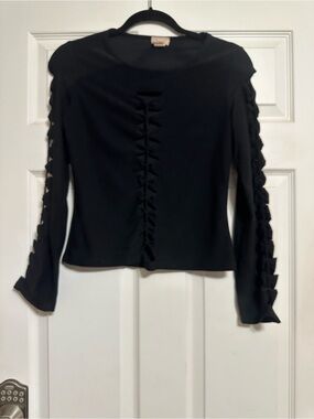 Biker shirt. Black Women’s Long Sleeve hole Accents down middle and sleeves Top